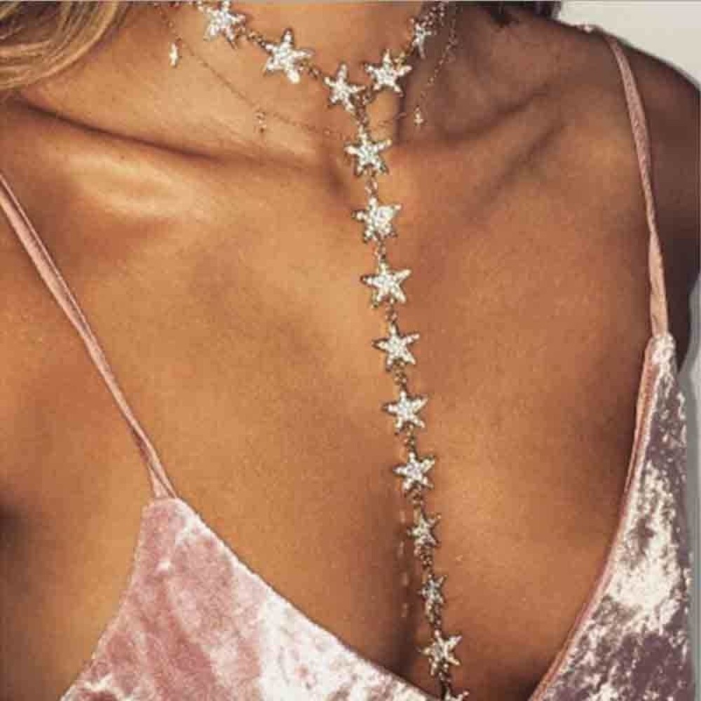Gold plated crystal rhinestone star necklace.